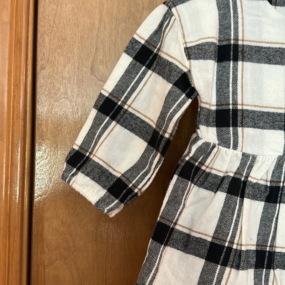 Girl’s 2 piece black and ivory plaid long sleeve dress with ribbed tights